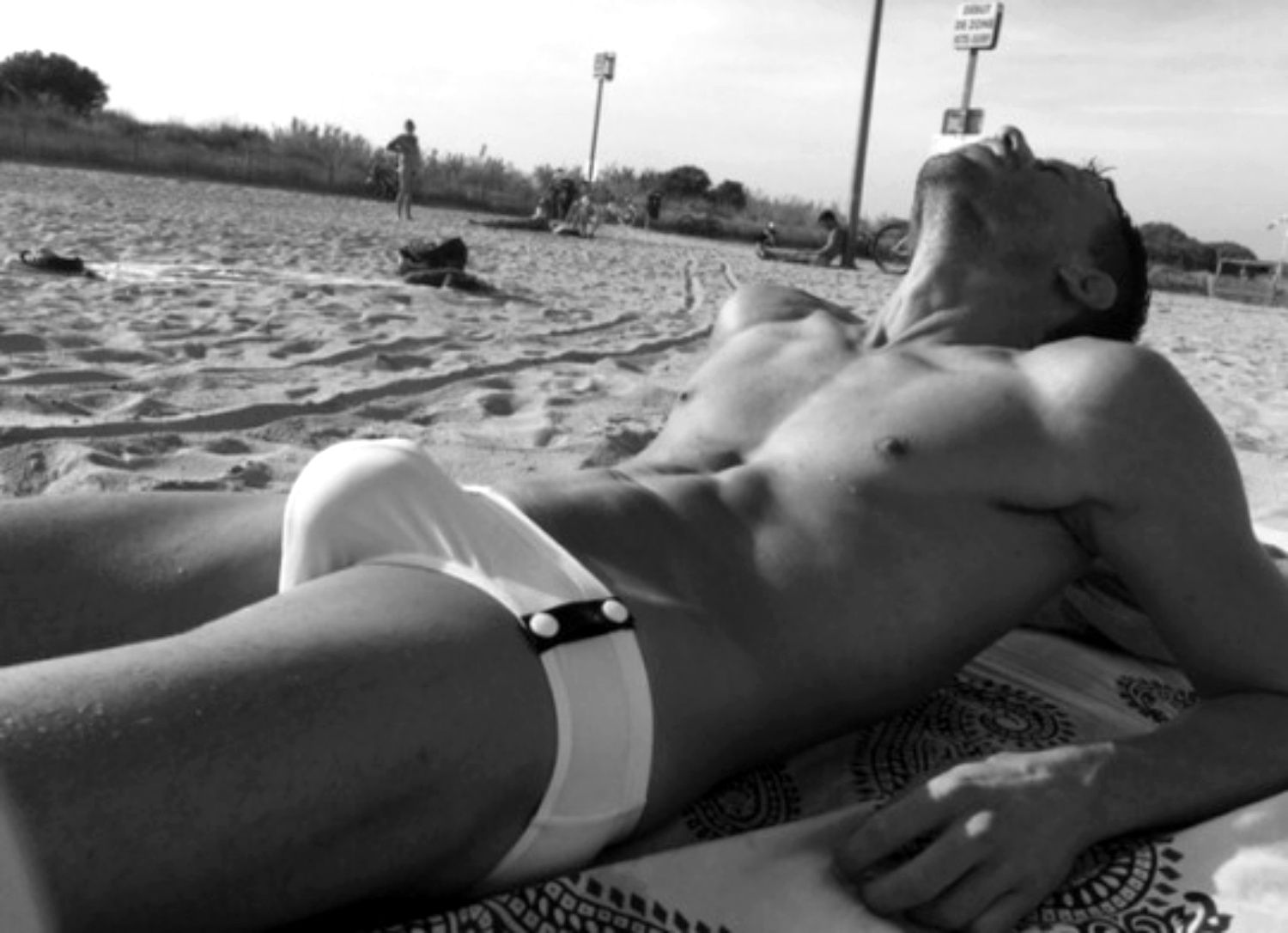 Dive In: Ripped Wet Bods in Speedos Await!